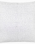 The John Robshaw Euro Sham is a white square pillow in organic cotton voile, featuring a minimalist crosshatch pattern of small, irregular black stitched lines across the surface.