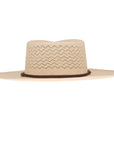 A beige Ninakuru Paloma Hat with a decorative ventilated pattern and a thin brown leather band, isolated on a white background.