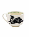 The Sir/Madam Grand Cup is a white ceramic mug with a black illustration of a Border Collie lying down and the dog’s name repeated in green text around the inner rim in four languages.