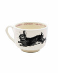 The Sir/Madam Grand Cup is a white ceramic mug featuring a black rabbit illustration. The inner rim displays the animal's name in four languages, repeated in vibrant colors for a global flair.