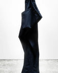 Favolamove Cashemere French Sailor Pant by Free City (sparrow, LLC) stands upright on a concrete floor against a plain white background, appearing as if worn by an invisible figure. The "art+commerce" logo is at the bottom left corner.