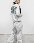 Free City Artistwanted long sleeve tee with bold Artists Wanted text on the back, casual style.