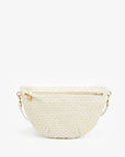 The Clare Vivier Grande Fanny S25 is a handwoven, cream leather belt bag with gold hardware, an adjustable strap, and a small round charm on the zipper pull, shown against a plain white background.