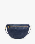 The Clare Vivier Grande Fanny S25 is a navy blue handwoven leather crossbody bag with a semicircular shape, front zipper pocket, gold hardware, and a detachable adjustable strap, shown against a plain white background.