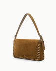 Brown suede Staud Harlow Bag with short strap and stitched edge on a white background.