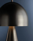 The Hudson Valley Hopkins Rechargeable is a modern metallic LED lamp with a dome-shaped mushroom shade and conical base, showcased against a dark blue background.