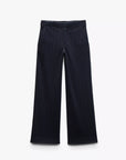 The Rag & Bone irina ponte tailored pant in navy features wide legs, subtle white pinstripes, two front pockets, and a tailored waistband, shown laid flat on a white background.