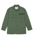 The Great Inc.’s The Vintage Army Jacket is an olive, long-sleeve cotton slub twill button-up with a collar, two chest pockets—one flapped and buttoned, one plain with a velvety patch—reminiscent of classic army style.