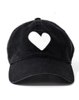 The Kerri Rosenthal Embroidered Heart Hat is a black collegiate cap from the KR CAP-Sule Collection, featuring a large embroidered heart patch on the front and shown against a plain white background.