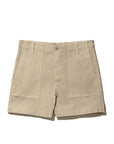 The City Short by Kule is crafted from premium Italian cotton in beige, featuring a button and zip closure, belt loops, and two large front pockets. Displayed laid flat against a white background.
