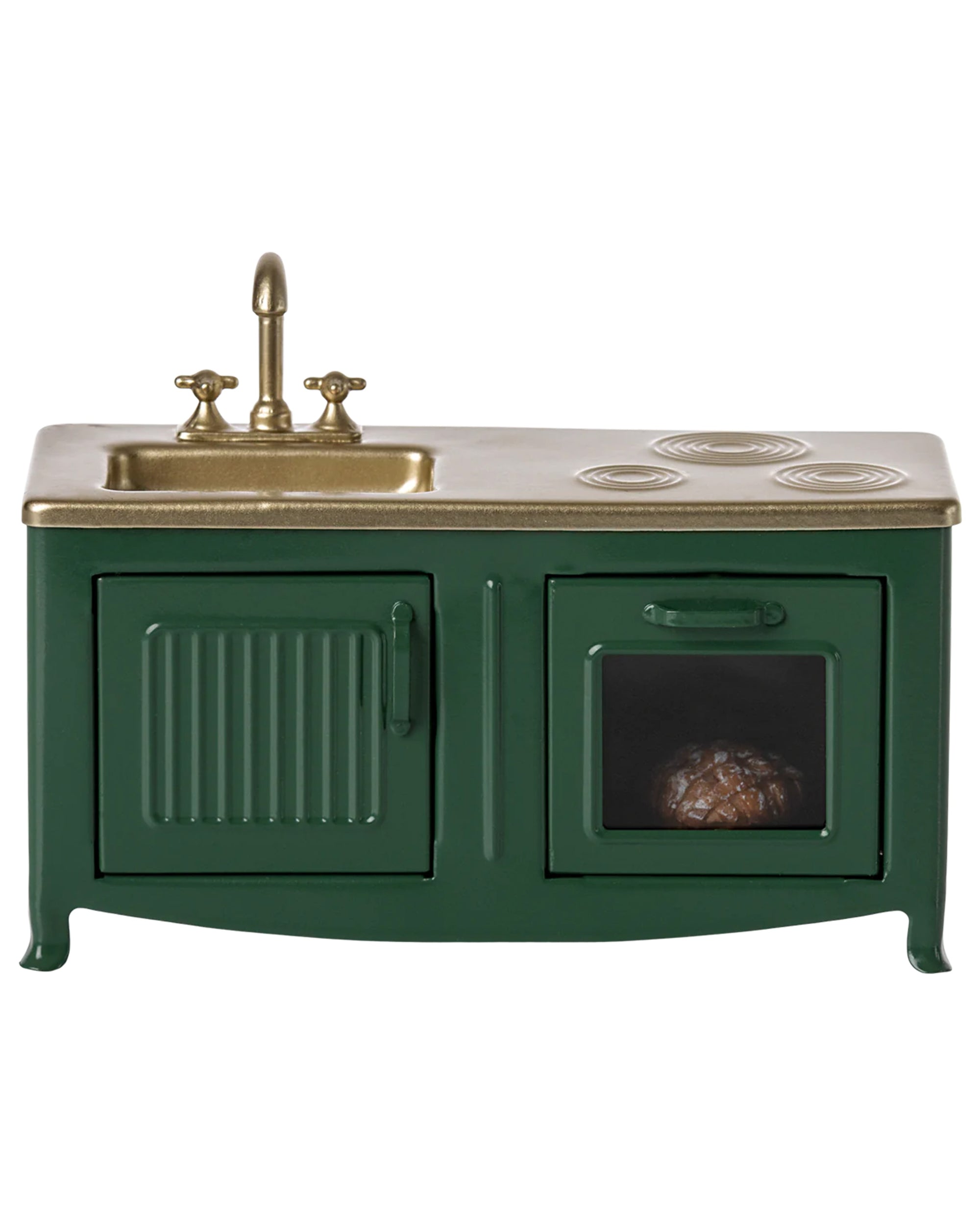 The Maileg Furniture kitchen set by Maileg is a miniature green set with a gold sink, faucet, stovetop, and oven. Its vintage-inspired design and tiny food in the oven make it ideal for any dollhouse or Maileg Mouse collection.