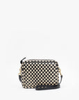 The Clare Vivier Midi Sac S25 is a handwoven leather rectangular crossbody bag featuring a black and beige checkerboard pattern, gold hardware, and a detachable black adjustable strap, shown on a plain white background.