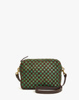 The Clare Vivier Midi Sac 26 is a small handwoven leather crossbody bag in a green and dark brown checkerboard pattern, featuring gold-tone hardware and a detachable dark brown leather strap, shown against a white background.