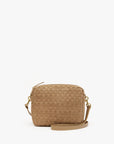 The Clare Vivier Midi Sac S25 is a small, tan rectangular crossbody bag featuring handwoven leather texture, gold-tone hardware, and a matching adjustable strap, shown against a plain white background.