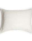 The Montauk Big Pillow 28x36 by POM POM is a rectangular, white pillow made from hand-loomed linen with flanged edges and a simple design, shown on a white background.