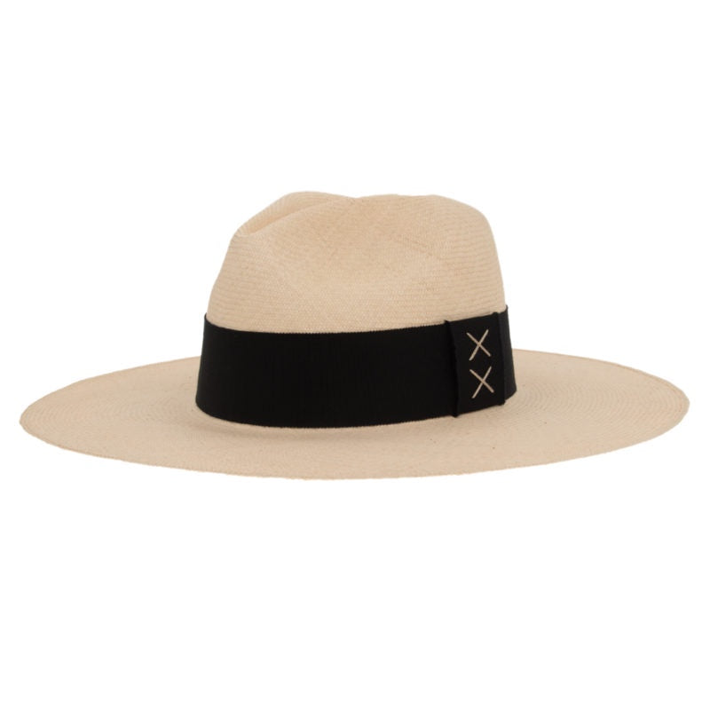 A beige wide-brimmed fedora hat with a Ninakuru Hutton Black Band featuring a simple black 'X' stitched design on the side, photographed on a plain white background.