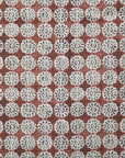 The Pindler Custom 4 Pillow 28x28 showcases a grid of white floral motifs on a reddish-brown background—an exclusive, ultra-luxurious design ideal for euro pillows or accent pieces.