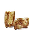 The Two's Company PEH023 Swirl Blown Glass Vases feature abstract brown and amber swirls; one is tall and cylindrical, the other shorter and oval, making them stunning artful accents for any home.
