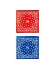 Two square Cocktail Paper Napkins by My Mind's Eye, one red and one blue with intricate white paisley patterns, are displayed vertically on a white background—ideal for holiday gatherings or stylish summer barbecues.