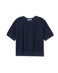 The Kennedy SS Crew Sweatshirt by Perfectwhitetee is a navy blue terry cloth short sleeve top with a relaxed fit, ribbed cuffs, neckline, and hem, shown on a white background.