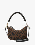The Clare Vivier Petit Moyen Messenger S25 is a small brown mini bag with a black leopard print, curved black handle, detachable black crossbody straps, and gold hardware.