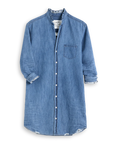 The Mary Classic Shirtdress-Ruffle by Frank & Eileen is a long-sleeved, knee-length denim dress with a stand collar, front button closure, chest pocket, and subtly frayed cuffs and hem.