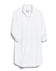 The RUFFLE MARY Classic Shirt Dress F25 by Frank & Eileen is a white long-sleeve shirtdress with a ruffle collar, button-down front, rolled-up sleeves, and chest pocket, shown against a plain background.