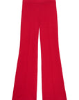 Donni's The Rib Kick Flare are bright red high-rise pants crafted in rib fabric with front seam detail, showcased against a plain white background.