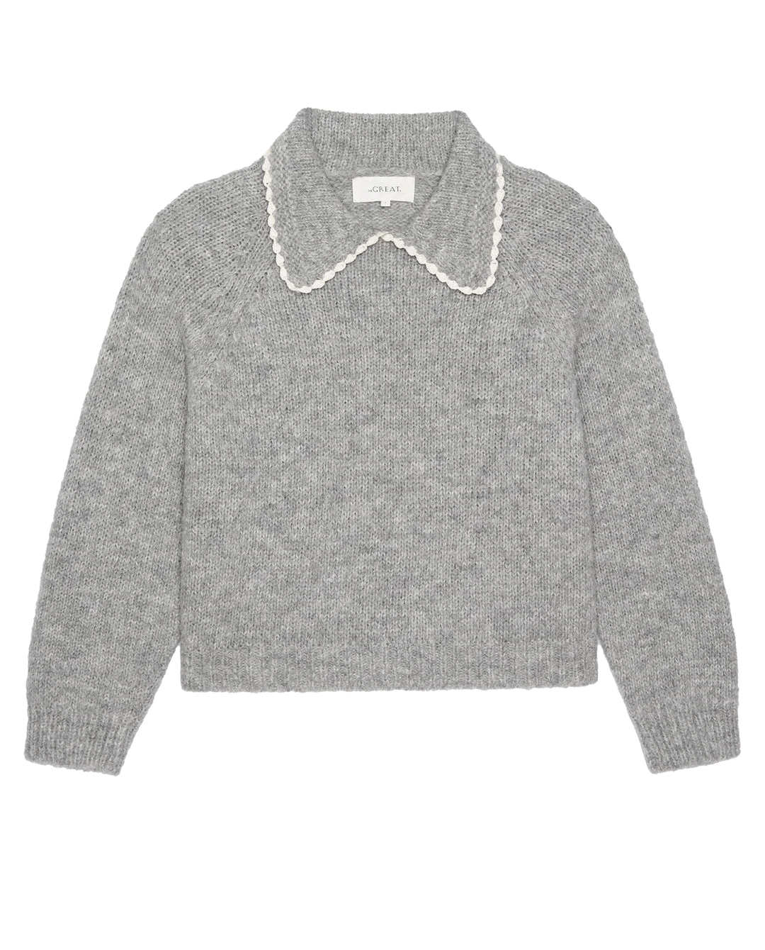 The Crochet Collar Pullover by The Great Inc.—a grey alpaca sweater with long sleeves and a wide, scalloped white crochet collar—laid flat on a white background.