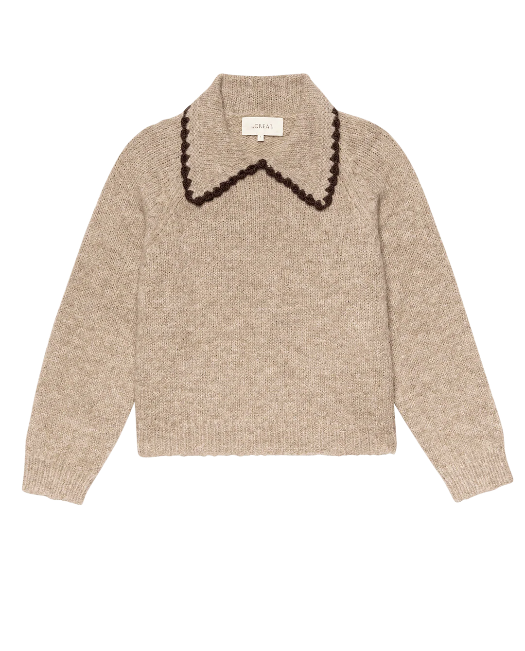 The Great Inc. The Crochet Collar Pullover is a beige, relaxed-fit long-sleeve knit sweater with a wide crochet collar and dark brown scalloped edge, shown on a white background.