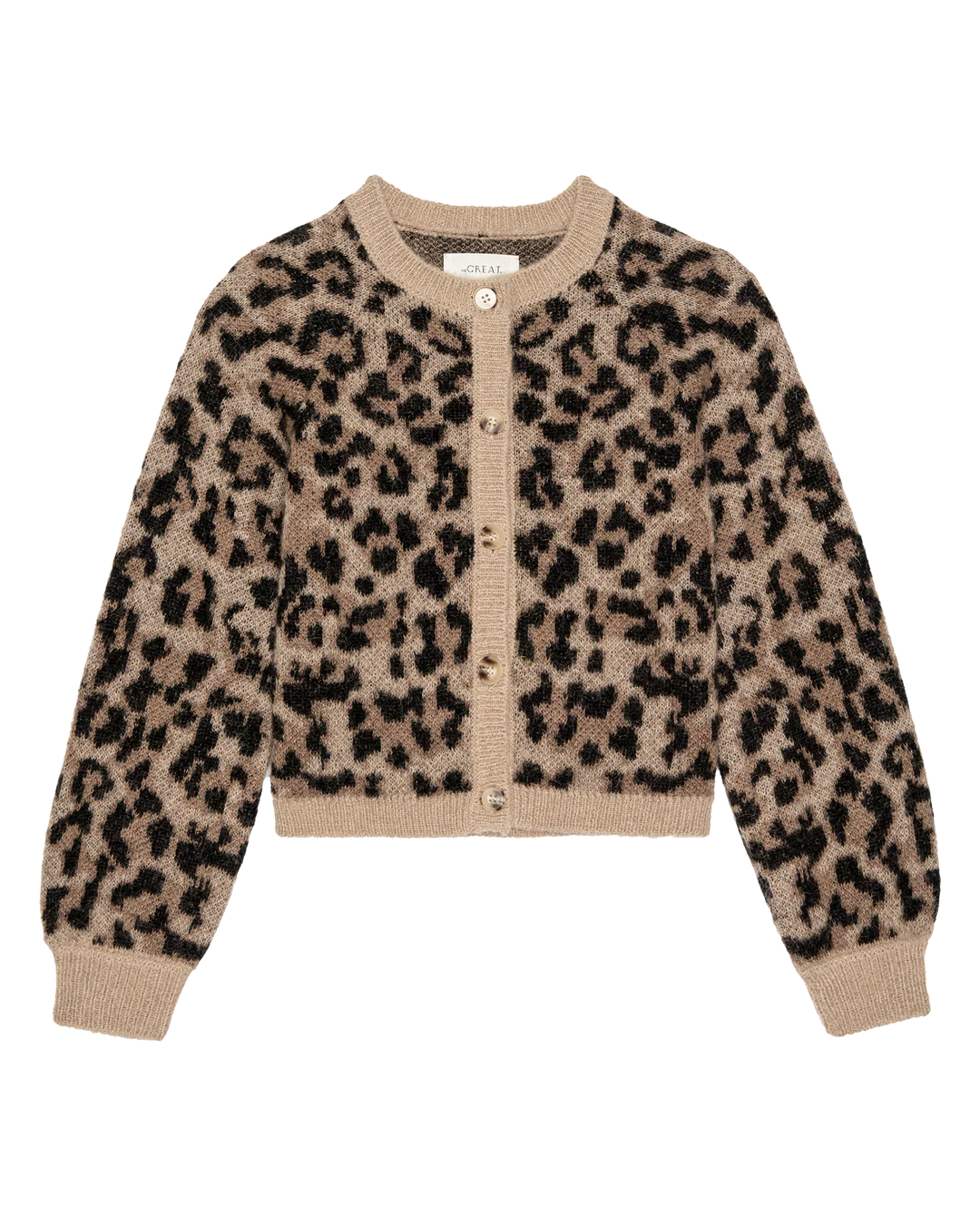 The Windsor Cardigan by The Great Inc. is a fuzzy, long-sleeve cropped cardigan in brown and black leopard jacquard, crafted from a soft alpaca blend with a round neckline, button-down front, and ribbed cuffs and hem.