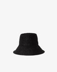 The FELIX BUCKET by Janessa Leone is a black raffia bucket hat featuring a slightly flared brim, shown against a plain white background.