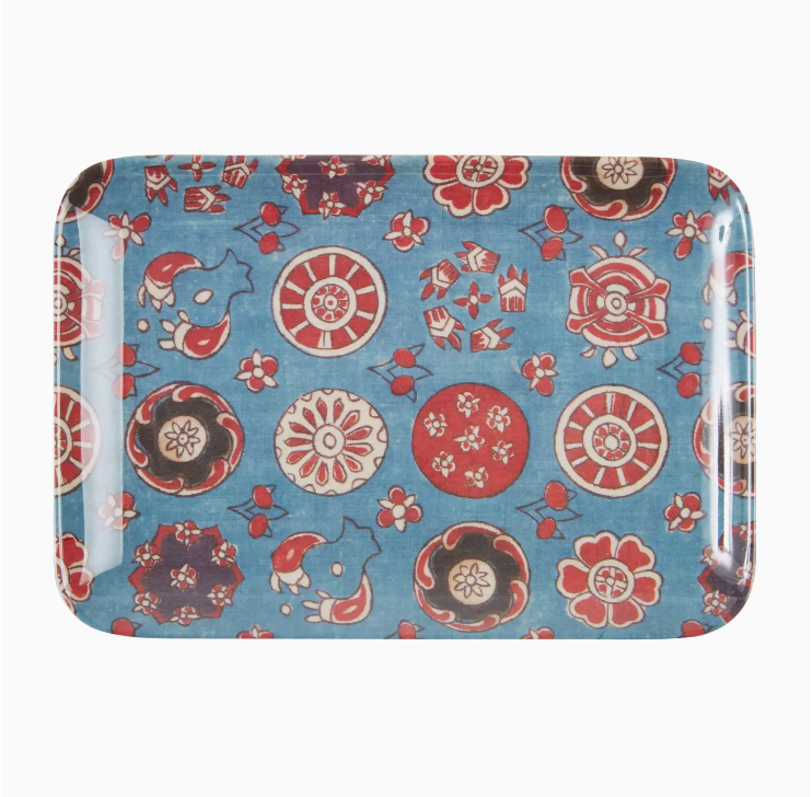 A Faire Medium Tray with a blue background featuring a traditional Asian-inspired pattern of red and white floral designs and ornamental motifs, perfect for a Scottsdale Arizona bungalow.