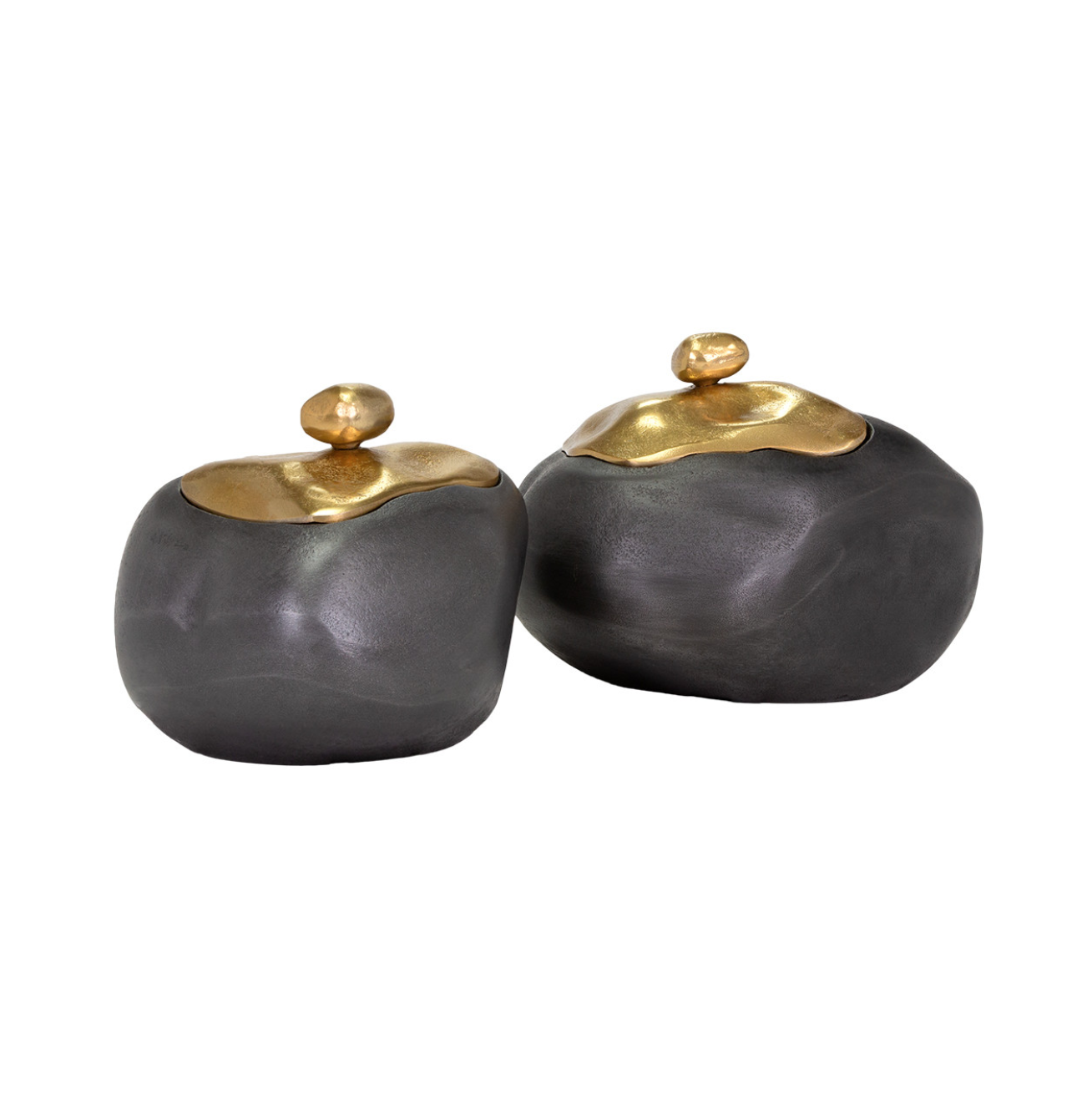 Two rounded, dark gray ceramic jars with golden lids, inspired by Scottsdale Arizona aesthetics, isolated on a white background. The Import Collection's Finkle Box.