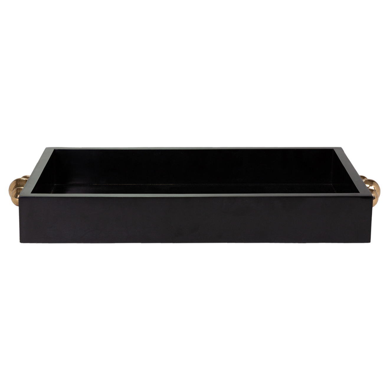 A rectangular black Ishani Tray from The Import Collection with gold handles on both ends. The product boasts a simple, sleek design and measures 20Lx12Wx3H. It is shown against a plain white background, emphasizing its elegant appeal.