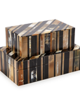 Two's Company EXW111 Horn Covered Boxes, featuring matching black, brown, beige, and cream stripes, are stacked for a stylish storage solution against a white background.