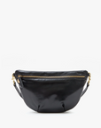Sentence with replaced product:

Grande Fanny Black by Clare Vivier with a gold zipper and matching gold chain details, displayed against a white Bungalow background.