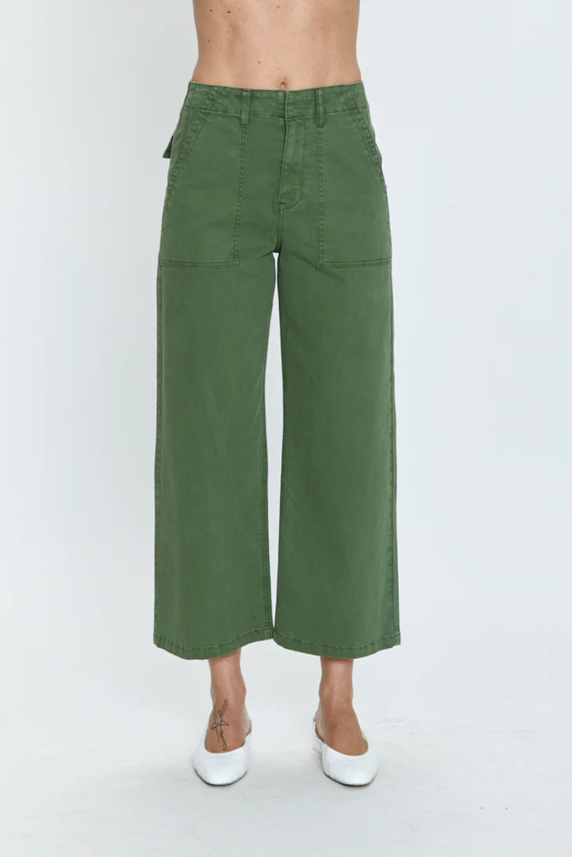 Front view of Pistola's SOPHIA WIDE LEG UTILITY ANKLE - BASIL pants showcasing Los Angeles-based style, worn by a person standing against a white background, featuring only the lower half of the body from the waist down.