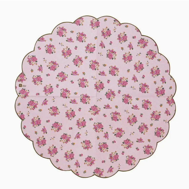 A round, scallop-edged Scalloped Pink Floral Napkins 20PK with a pattern of small pink and red roses on a white background, spaced evenly across the surface, perfect for a bungalow in Scottsdale, Arizona. (Faire)