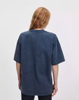 Navy Rag & Bone oversized university alex tee in cotton jersey, shown from the back on a person with long hair.