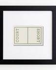 A framed print showcasing a minimalist design with the words "COURT" and "SHORT" separated by a vertical line. The green text on a white background contrasts elegantly against the black frame with a white mat, making this piece an eye-catching addition to any collection of Match South's Art Square Blk Frame prints or frames.
