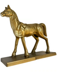 The Horse Bookend Set by Fox Run Brands features bronze-colored metal horses in a walking pose on rectangular bases—ideal decorative bookends to add charm to your shelf or study.