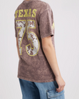 A person wearing the DayDreamer Willie Nelson Red Headed Stranger Tee.