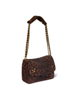 The Lulu Small Bag by Jerome Dreyfuss is a brown leopard print leather shoulder bag with a gold chain strap and gold stud accents, shown on a white background.