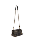 The Bobi Bag by Jerome Dreyfuss features black crocodile-textured leather, a gold chain strap, leather shoulder strap, and small gold accents, shown against a plain white background.