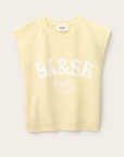 The BA&SH Sweat Benta is a sleeveless, light yellow sweatshirt with raglan armholes, a round neckline, and "BA&SH 2003 PARIS" text with a laurel graphic on the front.