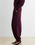 Rachel Comey Nim Pant and matching top in beige, styled with heels on neutral carpet by a white wall.