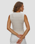 KUJTEN Gia Tweed sleeveless top in white, shown from the back, paired with white pants in a minimal setting.