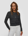 KUJTEN Caroline Cardi Tweed in light pattern, styled with white pants against a light gray backdrop.