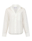 The Daily Shirt by Cissa is a white, long-sleeve button-up with a collar, subtle leaf-pattern eyelets, single chest pocket, and crafted from airy PAPER COTTON for a relaxed, semi-sheer look.